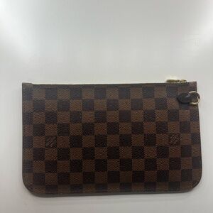 100% Authentic Louis Vuitton, Damier Ebene pouch.  New never worn.